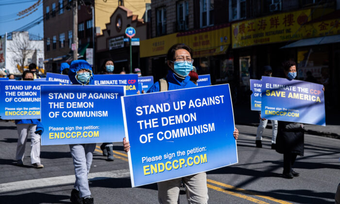 Falun Gong practitioners gather to support the withdrawal of 390 million people from the Chinese Communist Party and its associate groups, in Brooklyn, New York, on Feb. 27, 2022. (Chung I Ho/The Epoch Times)